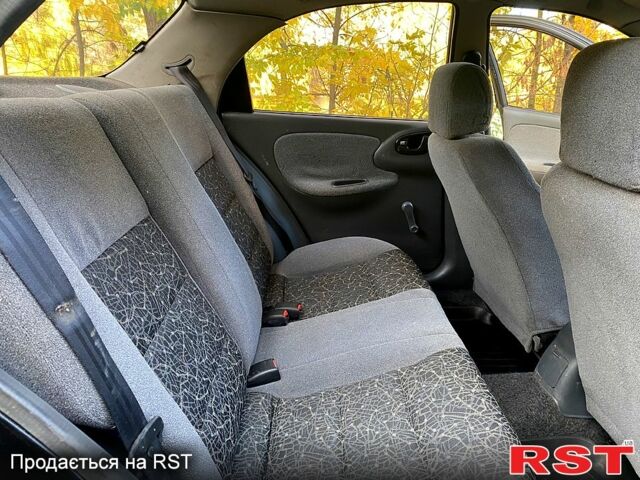 Дэу Ланос 2008 в Кривом Роге на Automoto.ua Черный Дэу Ланос, объемом двигателя 1.5 л и пробегом 105 тыс. км за 2700 $, фото 8 на Automoto.ua