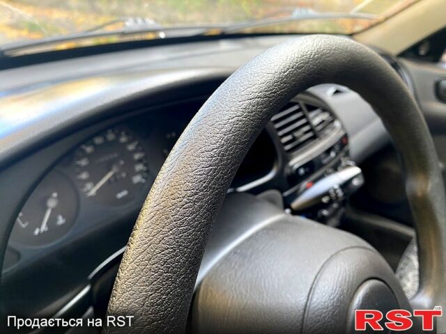 Дэу Ланос 2008 в Кривом Роге на Automoto.ua Черный Дэу Ланос, объемом двигателя 1.5 л и пробегом 105 тыс. км за 2700 $, фото 6 на Automoto.ua