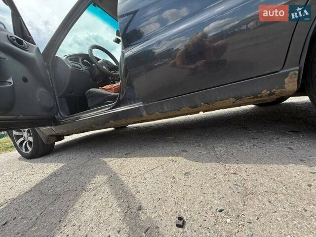 Дэу Ланос 2008 в Полтаве на Automoto.ua Черный Дэу Ланос, объемом двигателя 1.5 л и пробегом 245 тыс. км за 2400 $, фото 5 на Automoto.ua