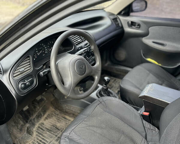 Черный Дэу Ланос, объемом двигателя 1.5 л и пробегом 219 тыс. км за 2300 $, фото 11 на Automoto.ua