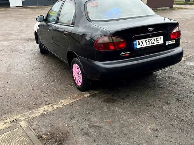 Черный Дэу Ланос, объемом двигателя 1.4 л и пробегом 202 тыс. км за 1400 $, фото 3 на Automoto.ua