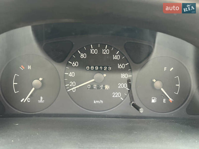 Чорний Деу Ланос, об'ємом двигуна 1.4 л та пробігом 89 тис. км за 2999 $, фото 19 на Automoto.ua