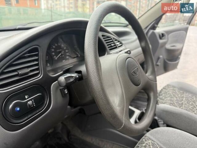 Черный Дэу Ланос, объемом двигателя 1.5 л и пробегом 128 тыс. км за 2999 $, фото 39 на Automoto.ua