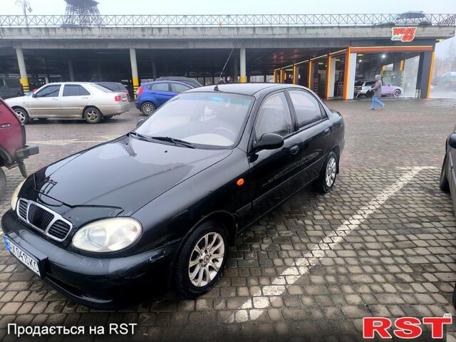 Черный Дэу Ланос, объемом двигателя 1.5 л и пробегом 220 тыс. км за 1000 $, фото 2 на Automoto.ua