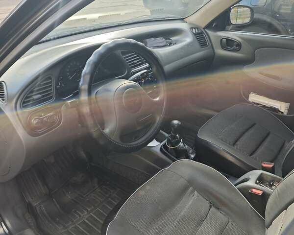 Деу Ланос 2008 у Запоріжжя на Automoto.ua Чорний Деу Ланос, об'ємом двигуна 1.5 л та пробігом 187 тис. км за 2350 $, фото 12 на Automoto.ua