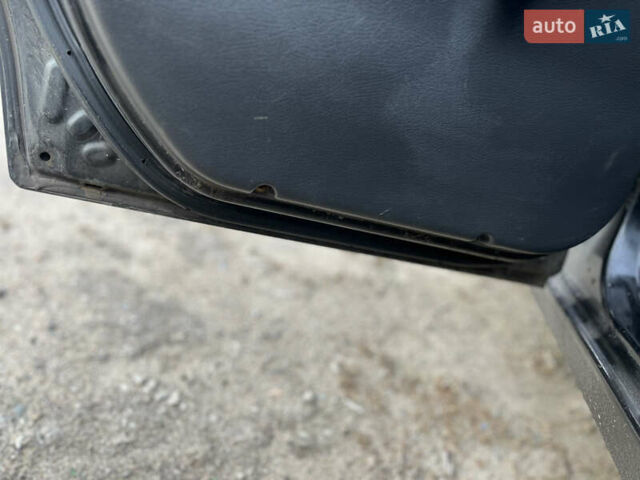 Черный Дэу Ланос, объемом двигателя 1.5 л и пробегом 219 тыс. км за 2300 $, фото 9 на Automoto.ua