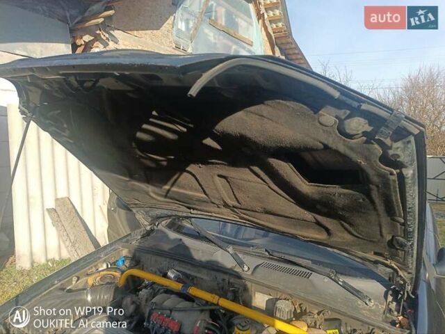 Чорний Деу Ланос, об'ємом двигуна 1.6 л та пробігом 355 тис. км за 2000 $, фото 40 на Automoto.ua