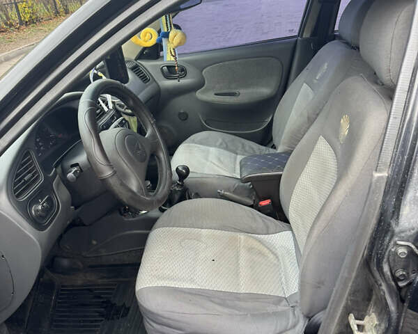 Черный Дэу Ланос, объемом двигателя 1.5 л и пробегом 142 тыс. км за 2799 $, фото 9 на Automoto.ua