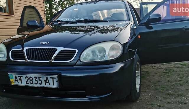 Черный Дэу Ланос, объемом двигателя 1.3 л и пробегом 160 тыс. км за 2000 $, фото 22 на Automoto.ua