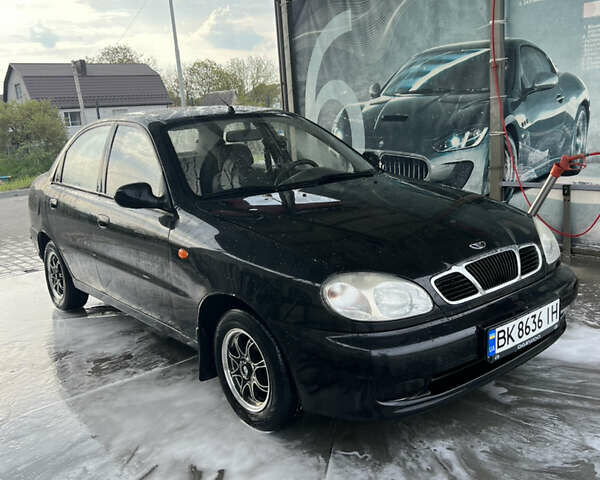 Черный Дэу Ланос, объемом двигателя 1.5 л и пробегом 162 тыс. км за 2200 $, фото 1 на Automoto.ua