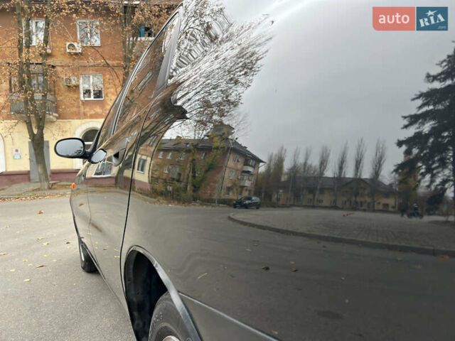 Чорний Деу Ланос, об'ємом двигуна 1.4 л та пробігом 89 тис. км за 2999 $, фото 8 на Automoto.ua