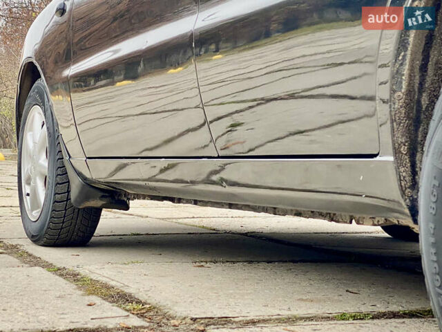 Черный Дэу Ланос, объемом двигателя 1.5 л и пробегом 198 тыс. км за 2500 $, фото 12 на Automoto.ua