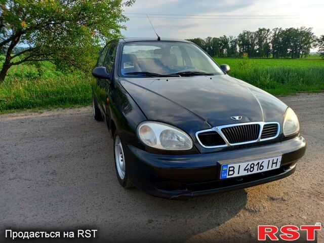 Черный Дэу Ланос, объемом двигателя 1.5 л и пробегом 368 тыс. км за 1150 $, фото 1 на Automoto.ua