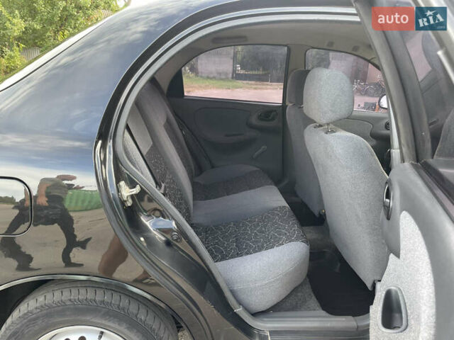 Черный Дэу Ланос, объемом двигателя 1.5 л и пробегом 122 тыс. км за 2950 $, фото 37 на Automoto.ua