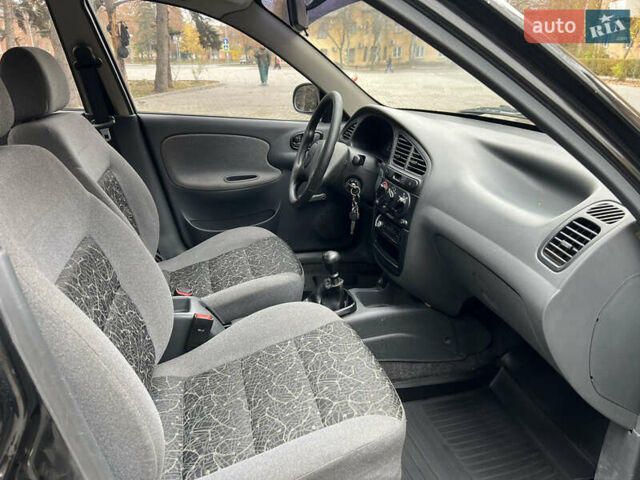 Чорний Деу Ланос, об'ємом двигуна 1.4 л та пробігом 89 тис. км за 2999 $, фото 14 на Automoto.ua