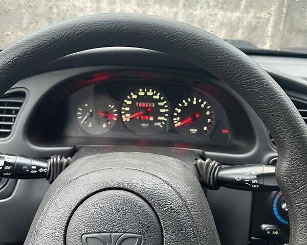 Чорний Деу Ланос, об'ємом двигуна 1.5 л та пробігом 168 тис. км за 3000 $, фото 8 на Automoto.ua