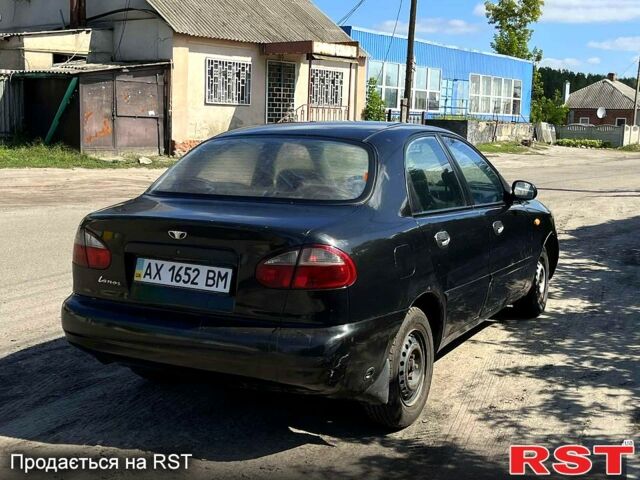 Чорний Деу Ланос, об'ємом двигуна 1.5 л та пробігом 150 тис. км за 1150 $, фото 5 на Automoto.ua