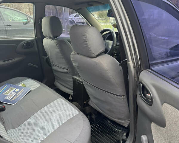 Черный Дэу Ланос, объемом двигателя 1.5 л и пробегом 142 тыс. км за 2799 $, фото 8 на Automoto.ua