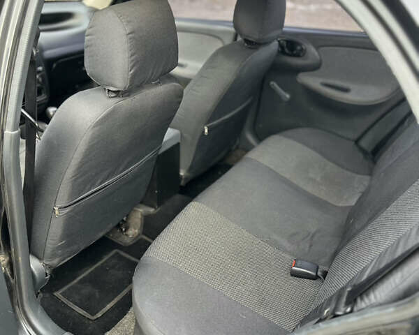 Черный Дэу Ланос, объемом двигателя 1.5 л и пробегом 219 тыс. км за 2300 $, фото 12 на Automoto.ua