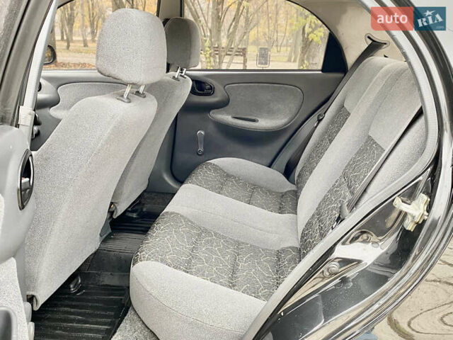 Чорний Деу Ланос, об'ємом двигуна 1.5 л та пробігом 198 тис. км за 2500 $, фото 19 на Automoto.ua