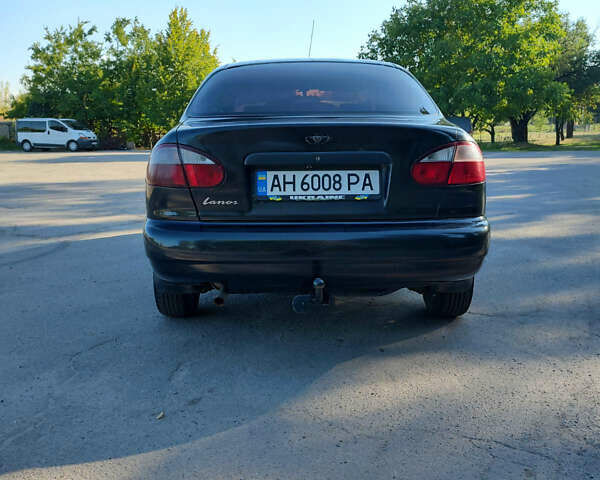 Черный Дэу Ланос, объемом двигателя 1.5 л и пробегом 160 тыс. км за 2500 $, фото 1 на Automoto.ua