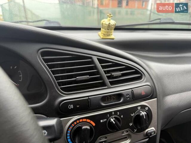 Черный Дэу Ланос, объемом двигателя 1.5 л и пробегом 128 тыс. км за 2999 $, фото 69 на Automoto.ua