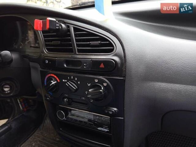 Черный Дэу Ланос, объемом двигателя 1.5 л и пробегом 180 тыс. км за 2300 $, фото 11 на Automoto.ua