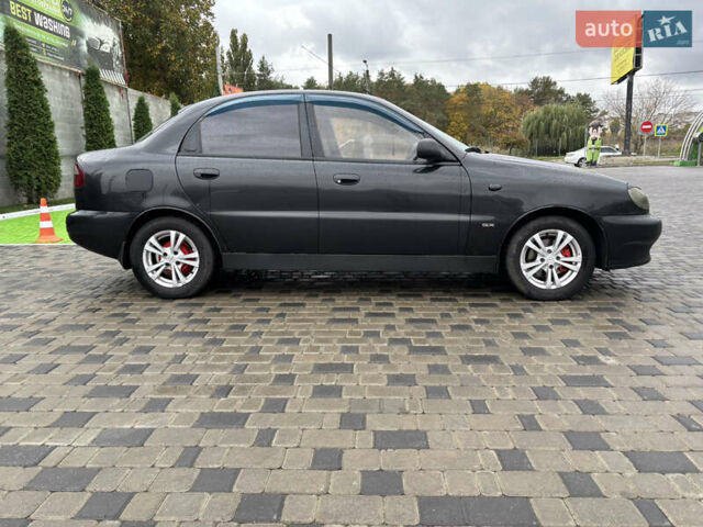 Черный Дэу Ланос, объемом двигателя 1.6 л и пробегом 270 тыс. км за 2900 $, фото 5 на Automoto.ua