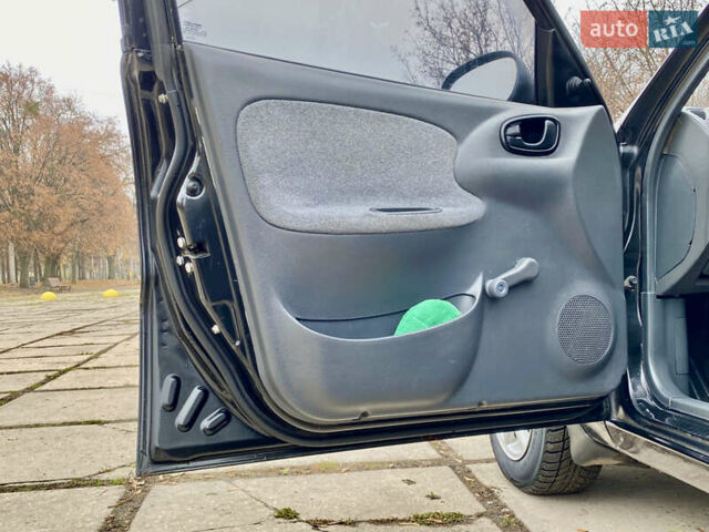 Чорний Деу Ланос, об'ємом двигуна 1.5 л та пробігом 198 тис. км за 2600 $, фото 17 на Automoto.ua