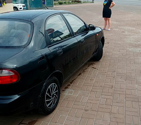 Черный Дэу Ланос, объемом двигателя 1.5 л и пробегом 194 тыс. км за 2000 $, фото 2 на Automoto.ua