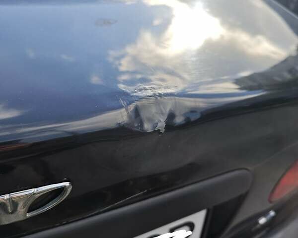 Деу Ланос 2008 у Запоріжжя на Automoto.ua Чорний Деу Ланос, об'ємом двигуна 1.5 л та пробігом 187 тис. км за 2350 $, фото 10 на Automoto.ua