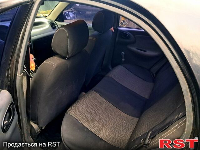 Черный Дэу Ланос, объемом двигателя 1.5 л и пробегом 385 тыс. км за 1600 $, фото 8 на Automoto.ua