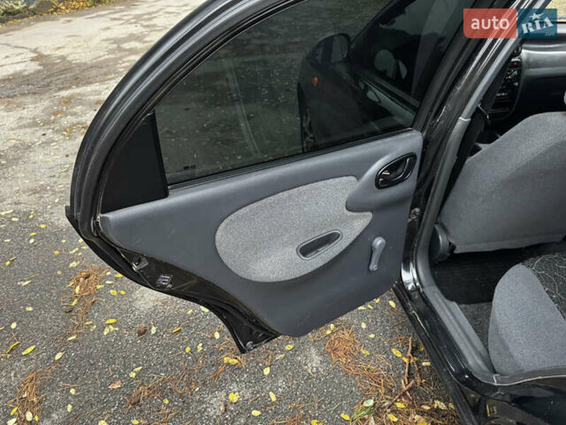 Чорний Деу Ланос, об'ємом двигуна 1.5 л та пробігом 220 тис. км за 2199 $, фото 14 на Automoto.ua