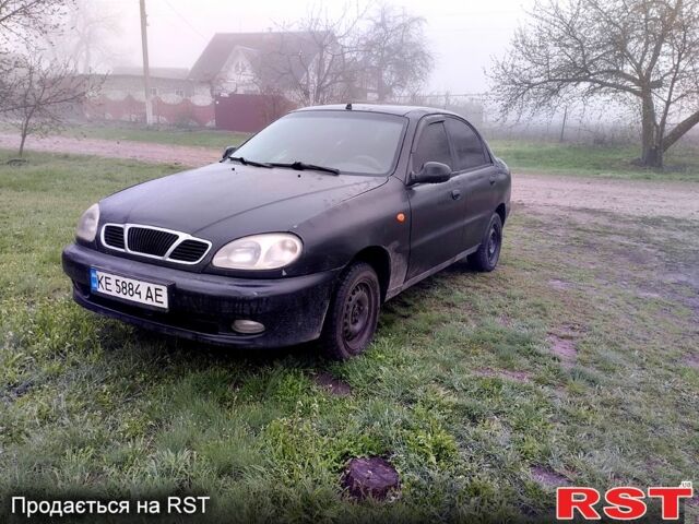 Черный Дэу Ланос, объемом двигателя 1.4 л и пробегом 0 тыс. км за 1800 $, фото 2 на Automoto.ua