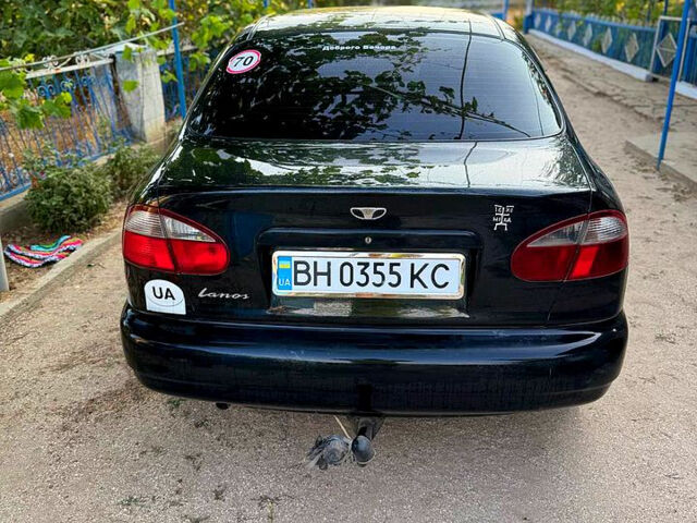 Черный Дэу Ланос, объемом двигателя 1.5 л и пробегом 192 тыс. км за 2700 $, фото 5 на Automoto.ua