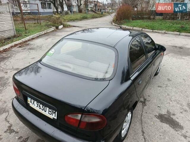 Черный Дэу Ланос, объемом двигателя 1.5 л и пробегом 240 тыс. км за 1800 $, фото 4 на Automoto.ua