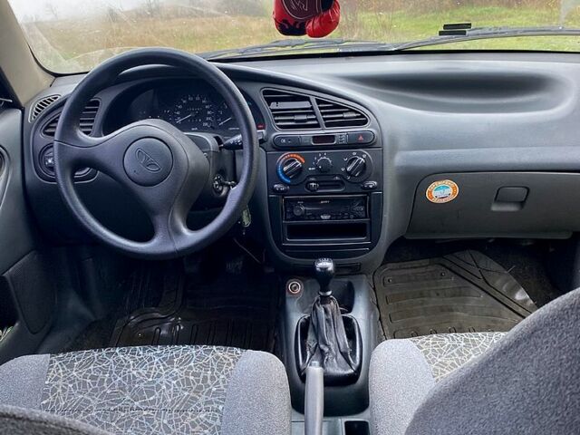 Чорний Деу Ланос, об'ємом двигуна 1.5 л та пробігом 256 тис. км за 1100 $, фото 12 на Automoto.ua