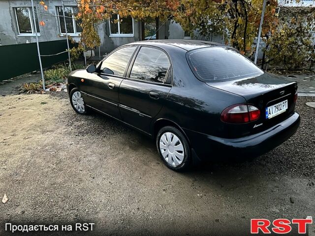 Черный Дэу Ланос, объемом двигателя 1.4 л и пробегом 220 тыс. км за 1800 $, фото 4 на Automoto.ua