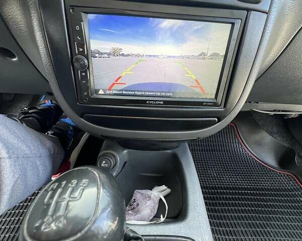 Чорний Деу Ланос, об'ємом двигуна 1.6 л та пробігом 137 тис. км за 3900 $, фото 14 на Automoto.ua