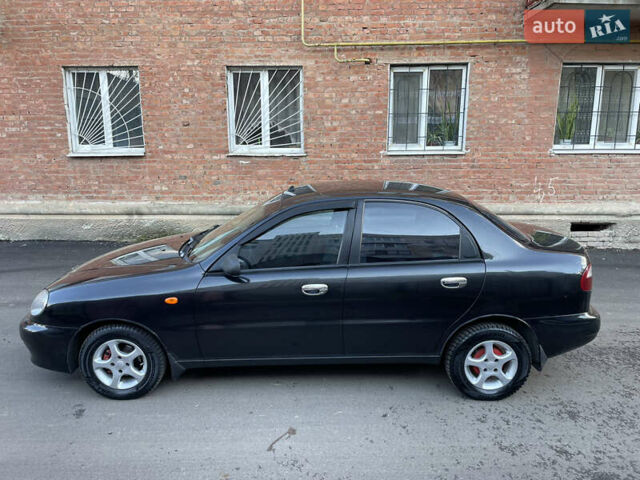 Черный Дэу Ланос, объемом двигателя 1.4 л и пробегом 233 тыс. км за 2500 $, фото 6 на Automoto.ua