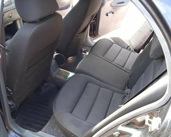 Черный Дэу Ланос, объемом двигателя 1.5 л и пробегом 170 тыс. км за 2850 $, фото 21 на Automoto.ua