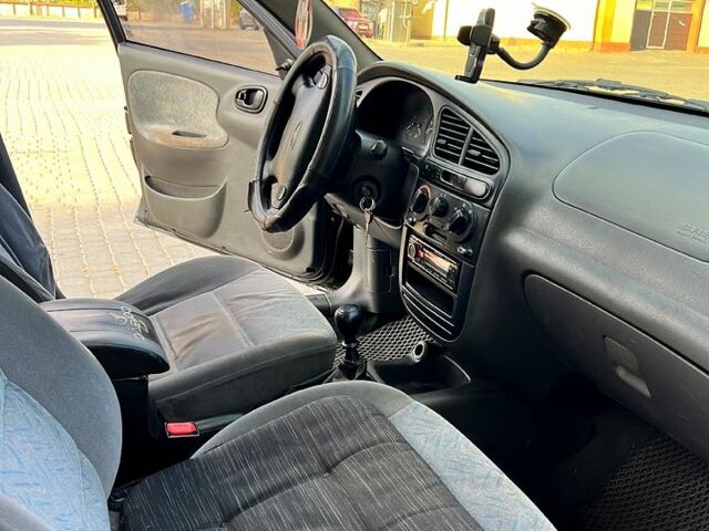 Черный Дэу Ланос, объемом двигателя 1.4 л и пробегом 0 тыс. км за 2300 $, фото 3 на Automoto.ua