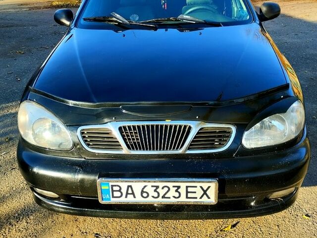 Чорний Деу Ланос, об'ємом двигуна 1.6 л та пробігом 238 тис. км за 2700 $, фото 1 на Automoto.ua