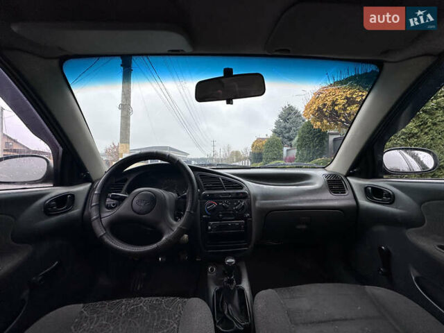 Черный Дэу Ланос, объемом двигателя 1.5 л и пробегом 267 тыс. км за 1499 $, фото 6 на Automoto.ua