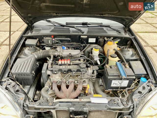 Чорний Деу Ланос, об'ємом двигуна 1.5 л та пробігом 198 тис. км за 2650 $, фото 31 на Automoto.ua