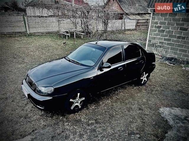 Черный Дэу Ланос, объемом двигателя 1.5 л и пробегом 213 тыс. км за 3000 $, фото 1 на Automoto.ua