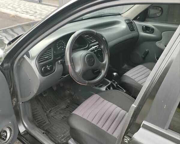 Черный Дэу Ланос, объемом двигателя 1.5 л и пробегом 173 тыс. км за 2200 $, фото 5 на Automoto.ua