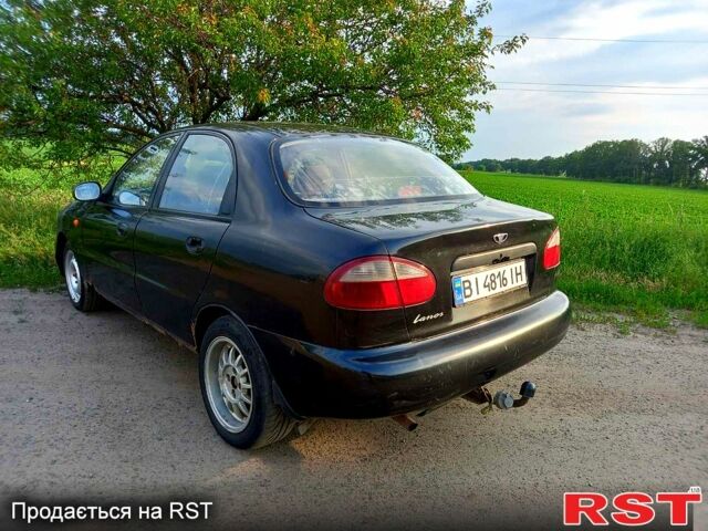 Черный Дэу Ланос, объемом двигателя 1.5 л и пробегом 368 тыс. км за 1150 $, фото 5 на Automoto.ua