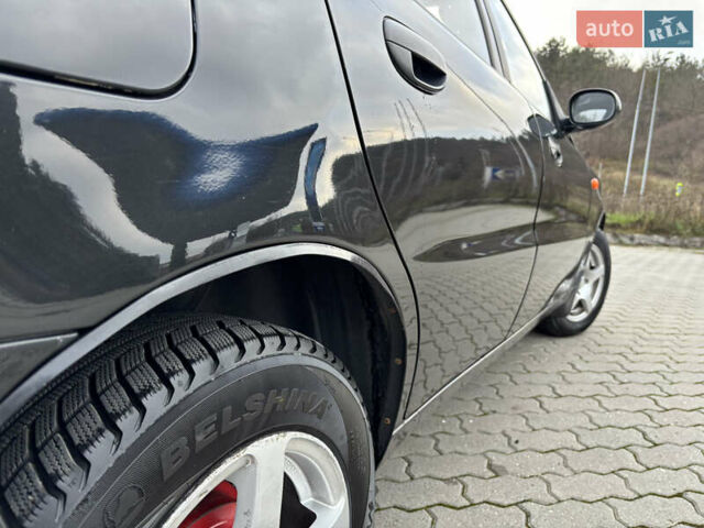 Чорний Деу Ланос, об'ємом двигуна 1.5 л та пробігом 186 тис. км за 2950 $, фото 3 на Automoto.ua