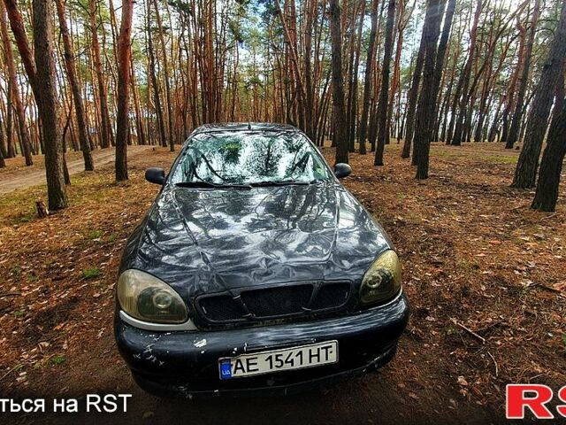Черный Дэу Ланос, объемом двигателя 1.4 л и пробегом 234 тыс. км за 1600 $, фото 11 на Automoto.ua